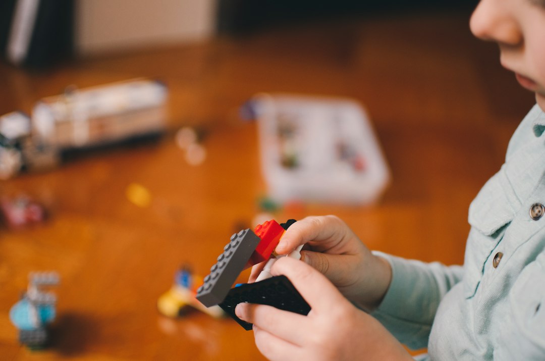 Child building blocks during occupational therapy