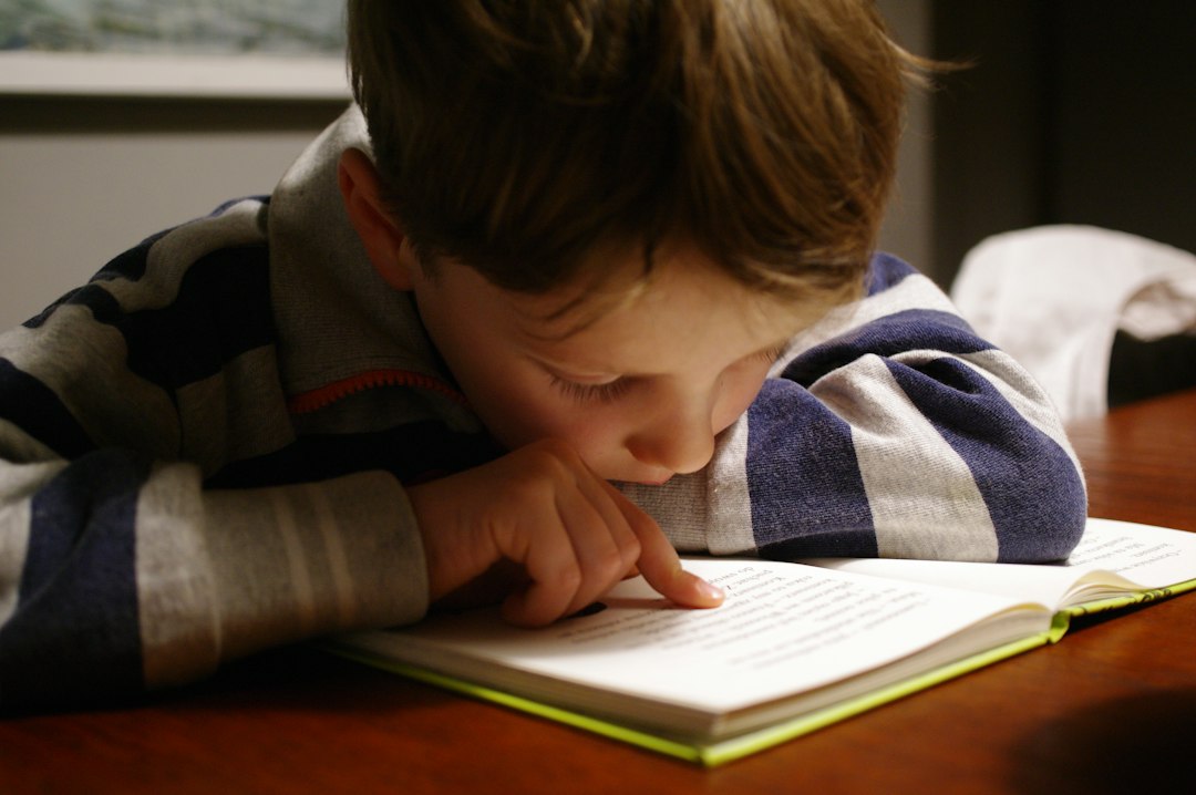 Child engaged in speech and language reading activity